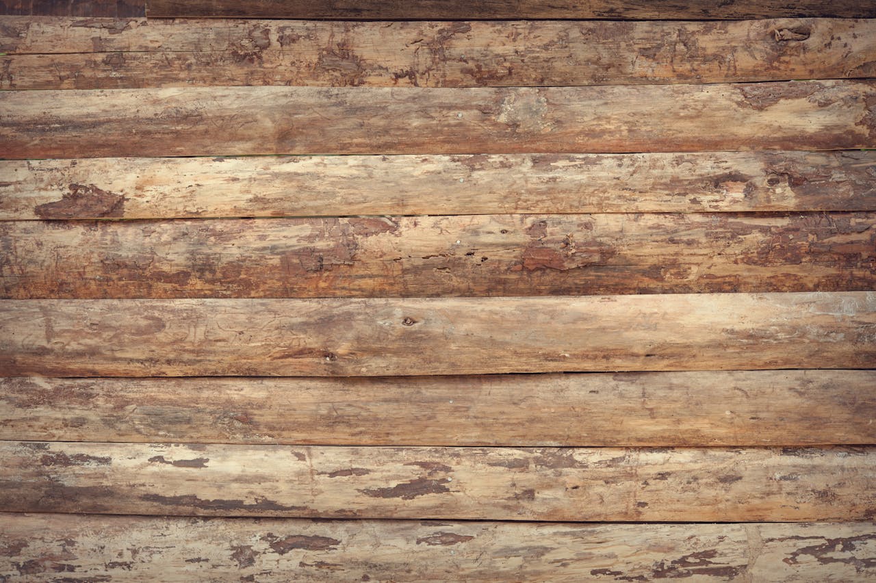 Close-up of weathered wooden planks creating a rustic textured background.